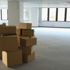 boxes sitting in empty warehouse space