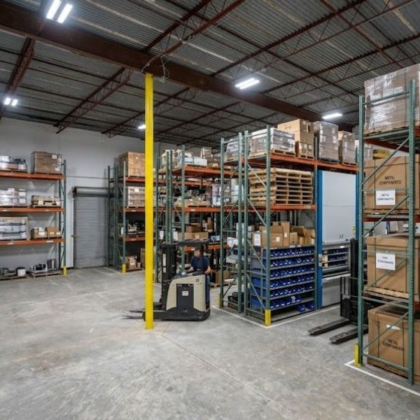 Vertical rack storage space for a manufacturing business