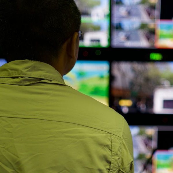 Security team monitoring cameras
