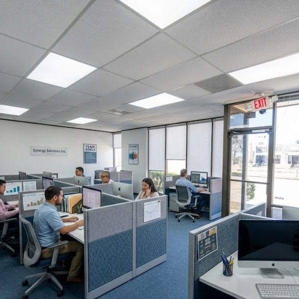 Small workspace for a company with cubicles and desktops